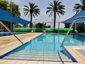 Гостиница Kibbutz Tiratzvi - Country Lodging  Tirat Ẕevi